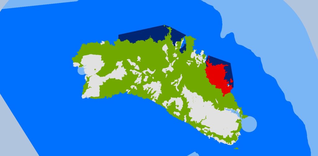 Mapa de zonificació de la Reserva de Biosfera, amb les zones nucli (vermell i blau fosc), zones de transició (verd i blau marí) i zones d'amortiment (gris i blau cel).